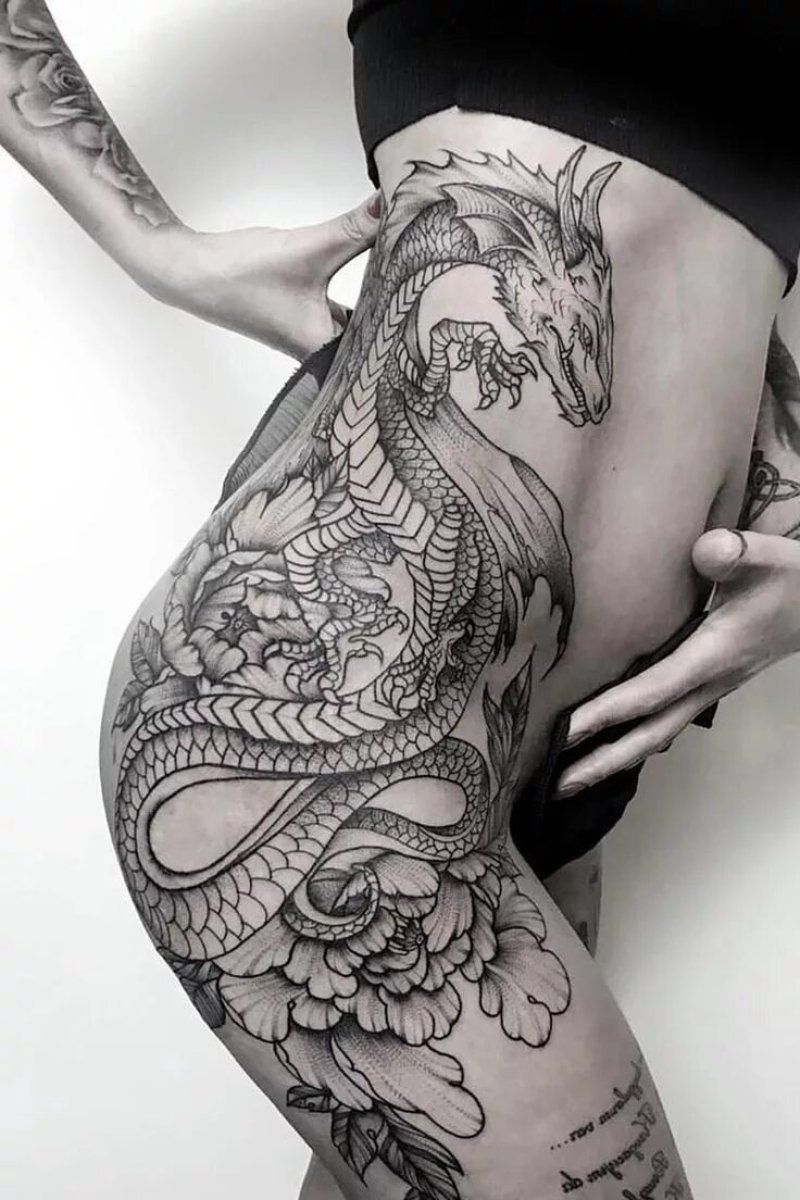 Дракон на бедре тату