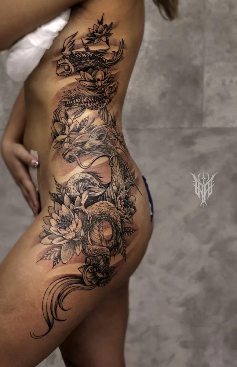 Тату на бедре для девушек дракон